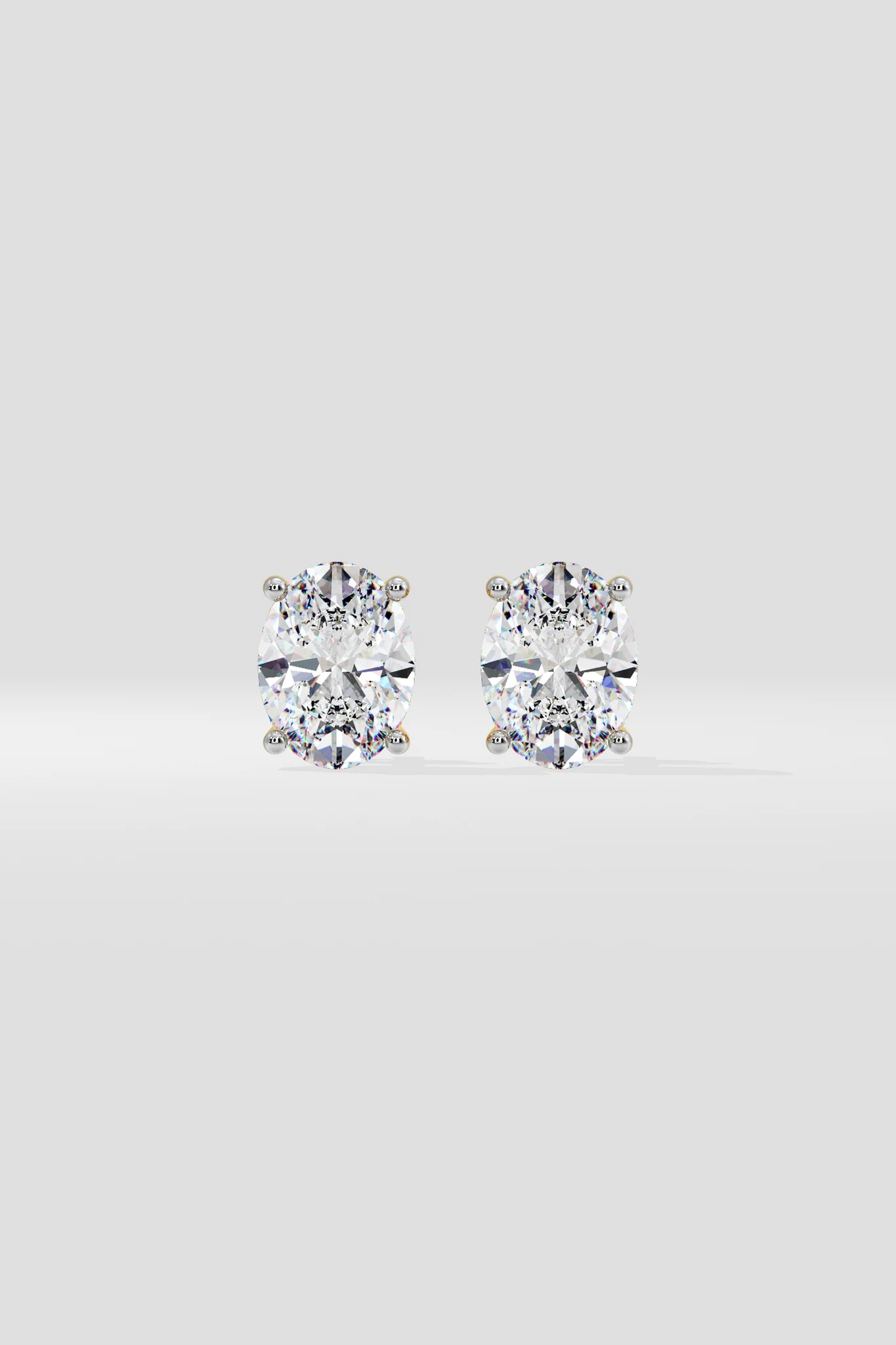 OVAL SOLITAIRE EARRINGS