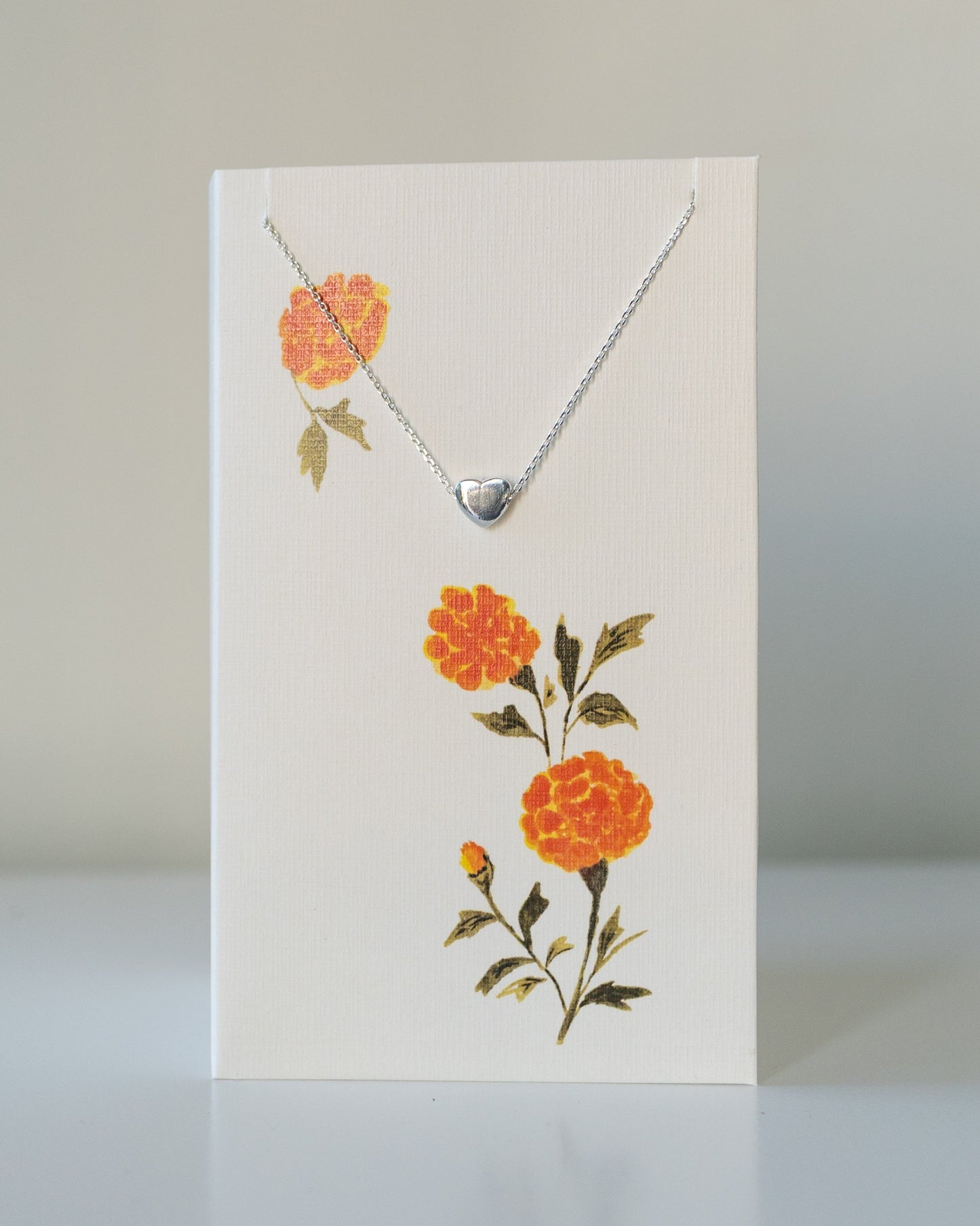 FESTIVE HEART NECKLACE